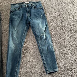 Zara Men’s blue ripped jeans